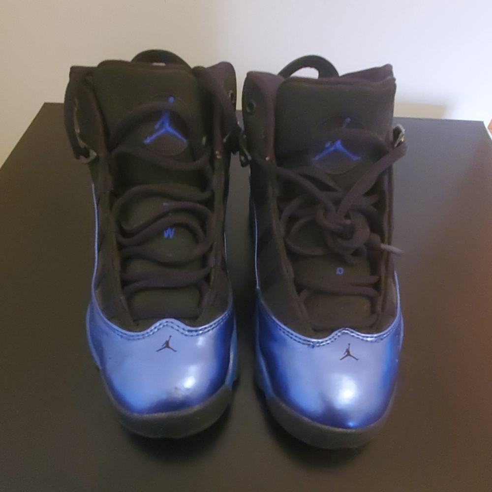 Royal blue and black jordan sneakers